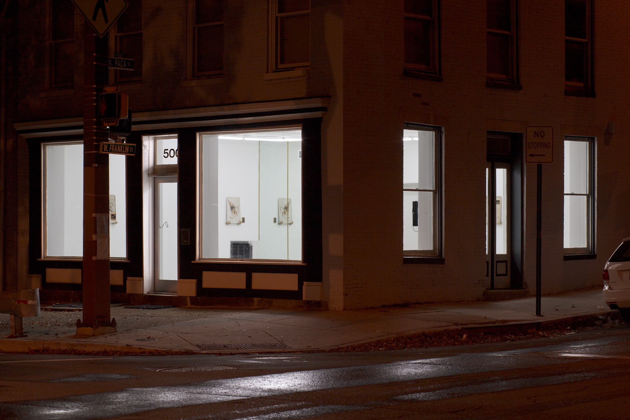 View of the gallery at night from across the street.